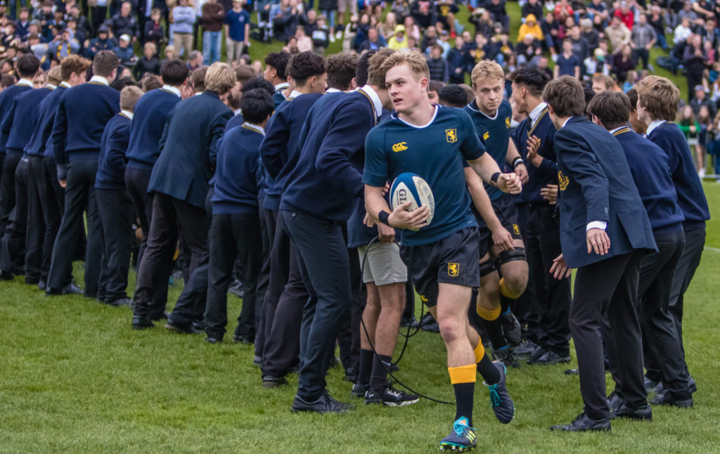 2021 Captain of the 1st XV Riley Williams leads the team out onto the field