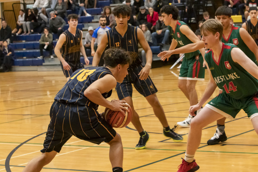 J. T. Todd in action against Westlake Boys High School