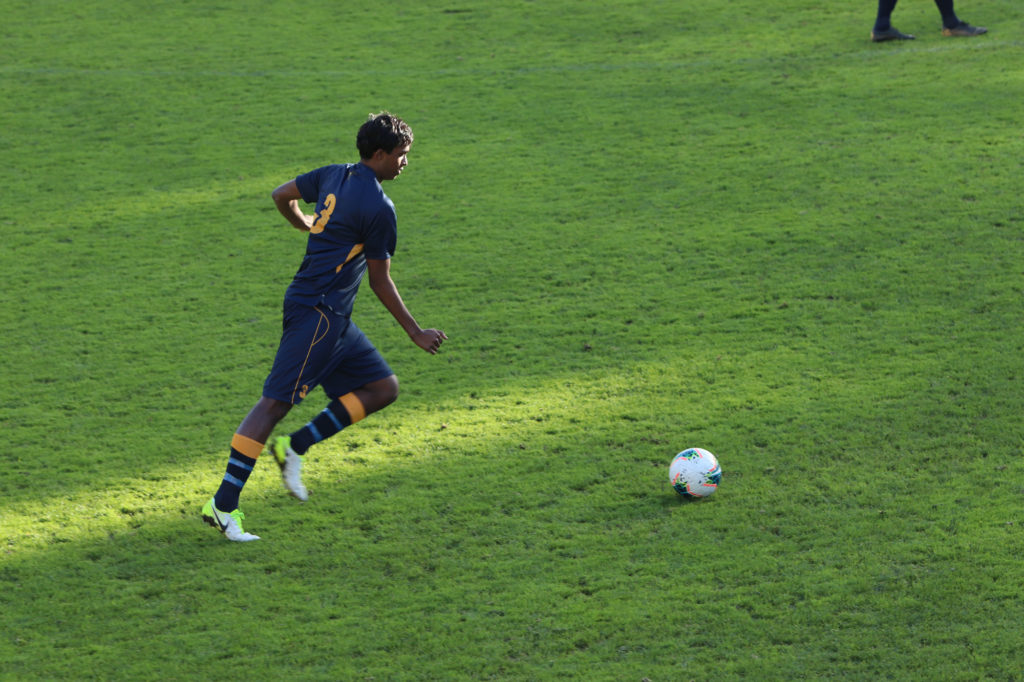 The 1st XI Football team in a game against Mount Albert Grammar School