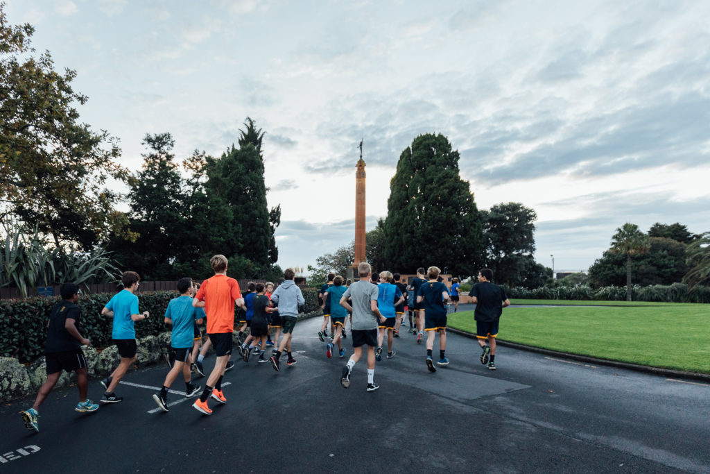 The Distance Squad leaving campus for an early morning training run