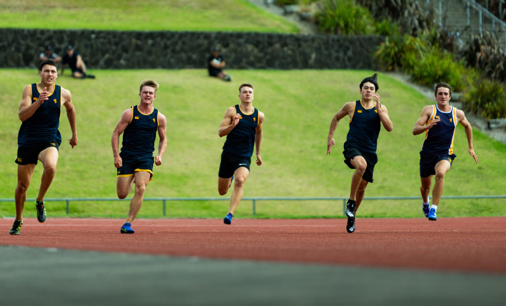 The senior 400m included 2021 Captain of Athletics S. M. Sutherland (centre)