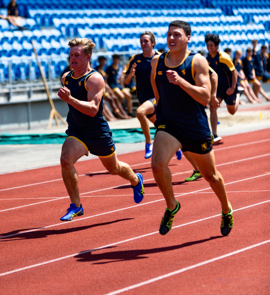 R. O. Williams and J. V. H. Naufahu in the 100m