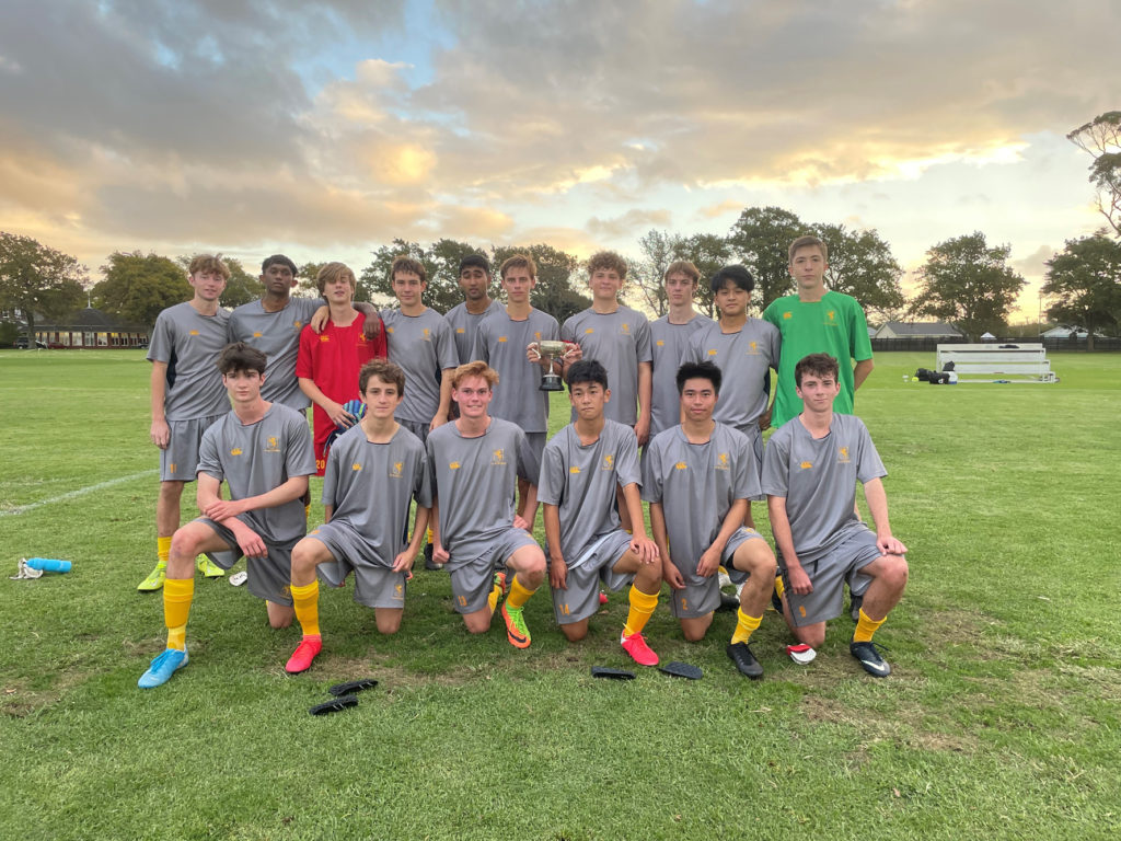 The 1st XI Football team winning the Morris Cup over King's College