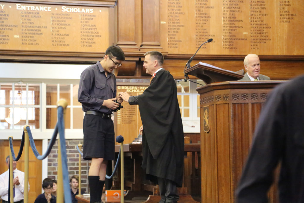 Yifei Wang '16 receives his medal as part of the Senior 8 x 50m relay team who were National Champions in 2019