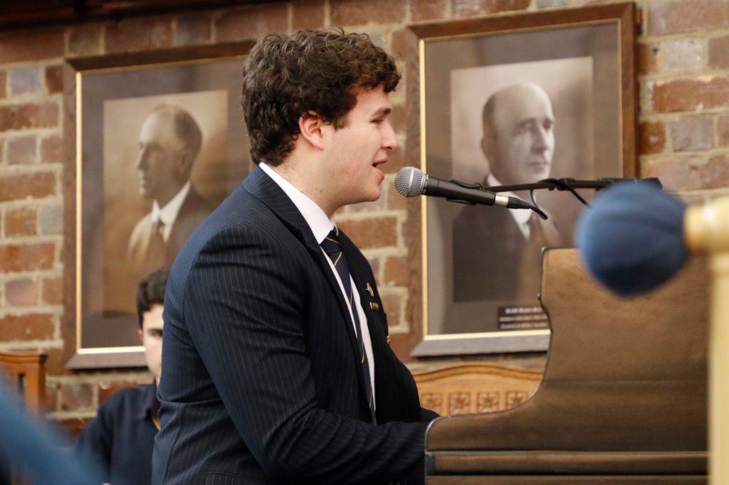 Ben Ross performs with the Big Band during assembly