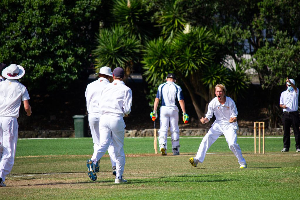 The 1st XI Cricket team celebrate after getting a wicket – Auckland ...