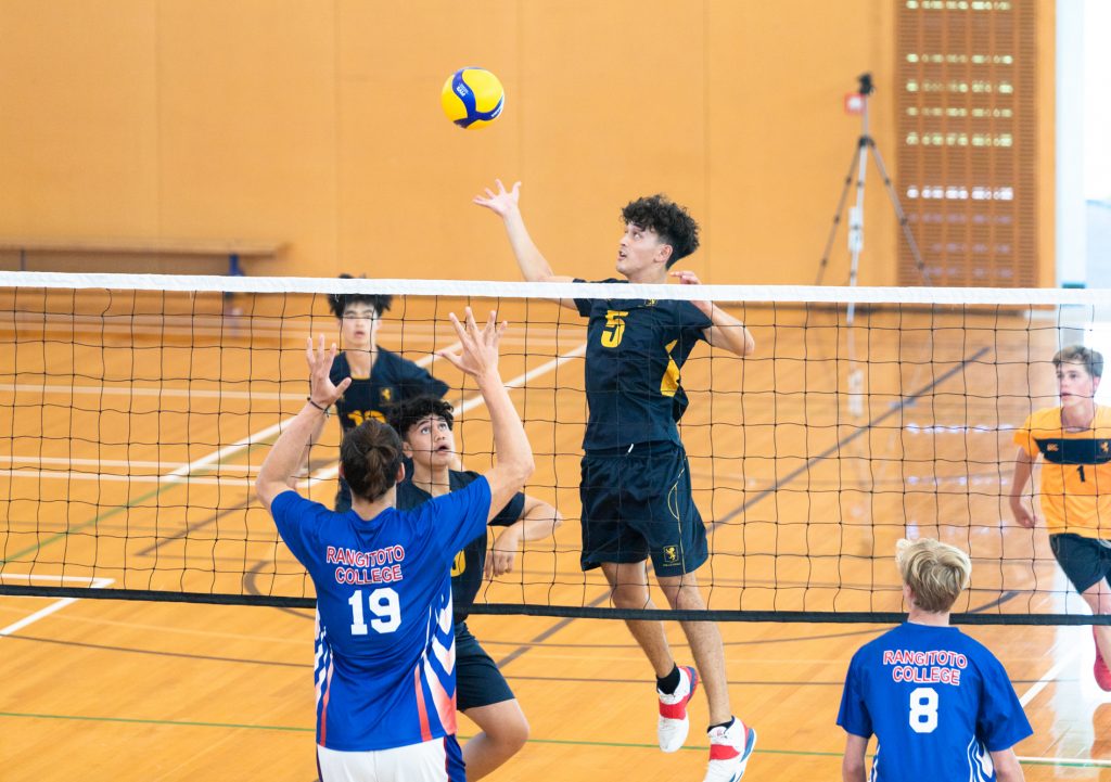 Form 6 student Dallas Kernan takes a hit against Rangitoto College