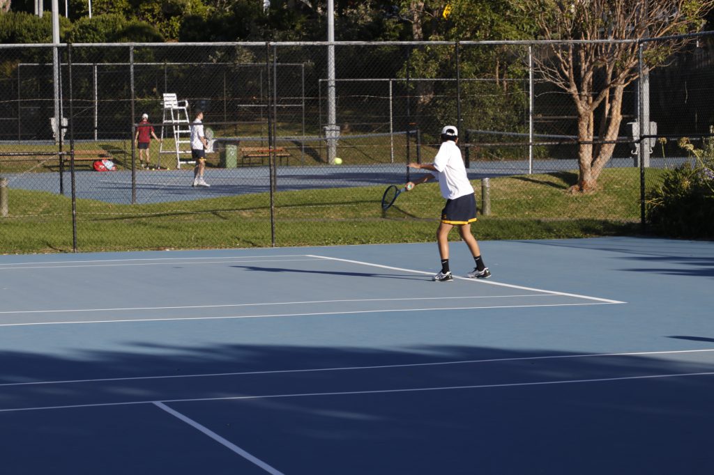 Form 3 student Zihan Mei in his singles match