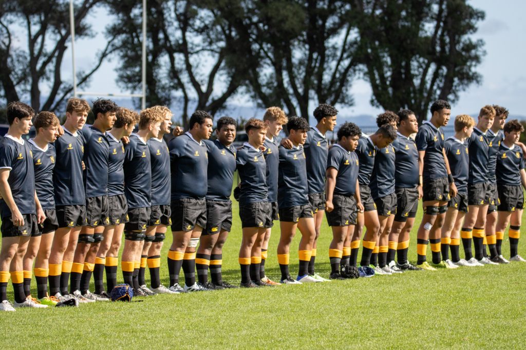 the 1st XV, led by captain Eddie Chaytor (far right)